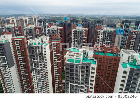Aerial view of multistory apartment in China Aerial view of multistory apartment in China 83302240