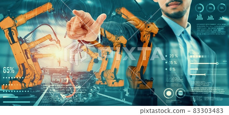 Mechanized industry robot arm and factory worker double exposure 83303483