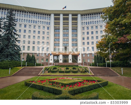 Republic of Moldova parliament building with beautiful garden. Rainy autumn day outdoors. Republic of Moldova parliament building with beautiful garden. Rainy autumn day outdoors. 83303999