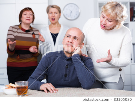 Mature woman is apologizing to friend for quarrel Mature woman is apologizing to friend for quarrel 83305080