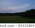 Countryside scenery in the evening-blue sky with a view of the moon- 83312869
