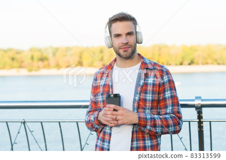 young handsome man in checkered shirt and modern  83313599