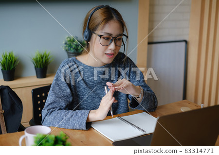 Student learning at home with online lesson by laptop computer. E-learning ,online ,education and internet social distancing protect from COVID-19 viruses concept. 83314771