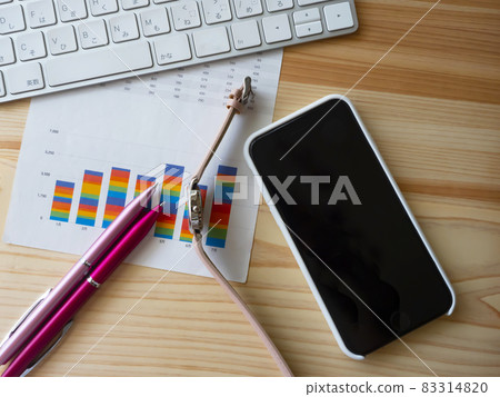 Business image, graph, keyboard, smartphone, woman 83314820