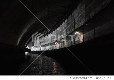 Industrial concrete tunnel perspective 83315937