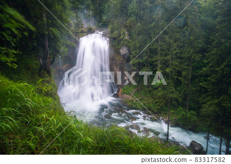 The Gollinger waterfall in Austria on rainy day The Gollinger waterfall in Austria on rainy day 83317582