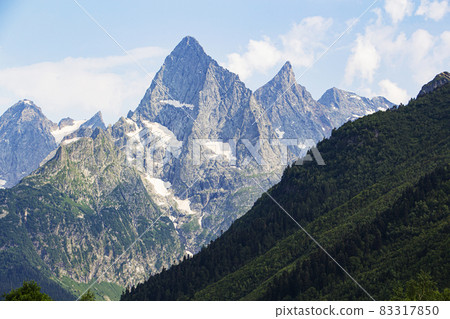 The Caucasus Mountains. Mountain peaks in summer. 83317850