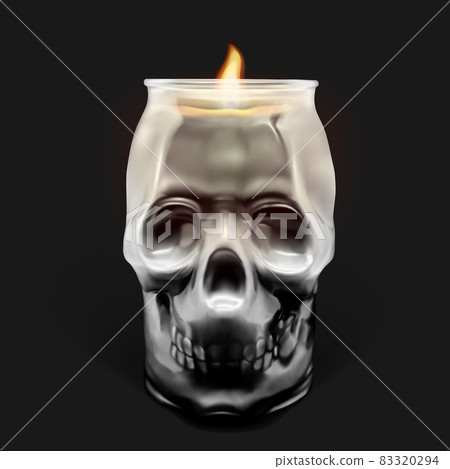 Glass transparent skull with a candle inside. Glass transparent skull with a candle inside. 83320294
