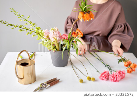 Step by step installation of flowers in a vase. Flowers bunch, set for home. Fresh cut flowers for decoration home. European floral shop. Delivery fresh cut flower. Step by step installation of flowers in a vase. Flowers bunch, set for home. Fresh cut flowers for decoration home. European floral shop. Delivery fresh cut flower. 83321572