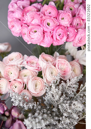 Set of white, pink and magenta flowers for Interior decorations. The work of the florist at a flower shop. Fresh cut flower. Set of white, pink and magenta flowers for Interior decorations. The work of the florist at a flower shop. Fresh cut flower. 83321602