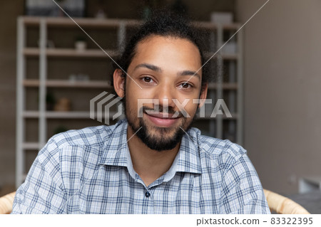 Head shot portrait handsome African American man looking at camera 83322395