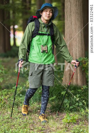 Young man enjoying a hike Young man enjoying a hike 83322461