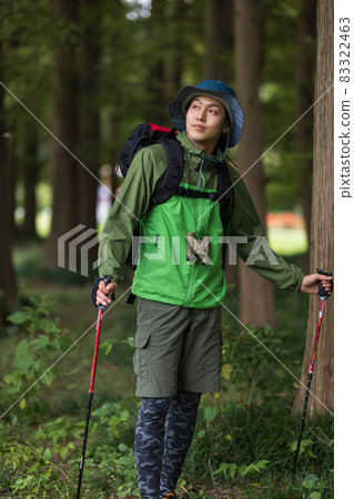 Young man enjoying a hike 83322463