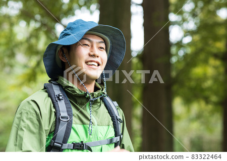 Young man enjoying a hike 83322464