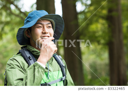 Young man enjoying a hike 83322465