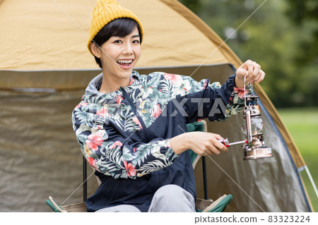 Cute lady enjoying the campsite 83323224
