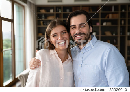 Head shot portrait of sincere smiling family couple. Head shot portrait of sincere smiling family couple. 83326640