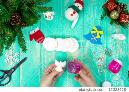Create a children's Christmas gift with a little angel toy made of cotton pads. Children's art project, handicrafts, handicrafts for children. Step-by-step instruction. Step 14 83328628