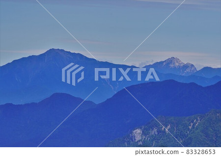 Mt. Senjo and Mt. Kaikoma from the north side of Mt. Okuchausu Mt. Senjo and Mt. Kaikoma from the north side of Mt. Okuchausu 83328653