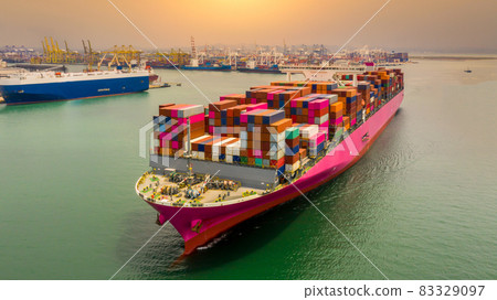 Container cargo ship and Car carrier ship in import export business commercial trade logistic and transportation, Car and Container cargo freight shipping. Container cargo ship and Car carrier ship in import export business commercial trade logistic and transportation, Car and Container cargo freight shipping. 83329097