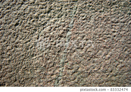 Brown, textured, marble or granite wall background. 83332474