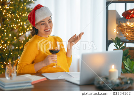 Woman working before Christmas Woman working before Christmas 83334162
