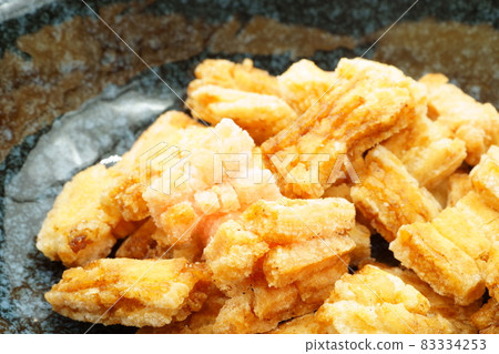 Hail made by chopping mochi into small pieces and fried in oil Hail made by chopping mochi into small pieces and fried in oil 83334253