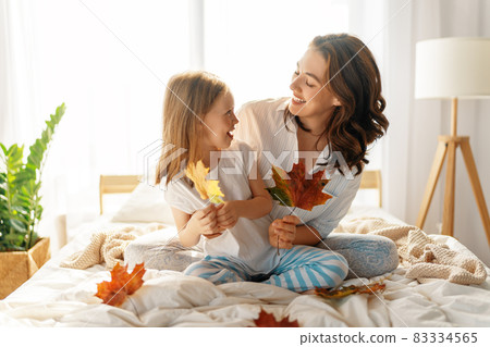 girl and mother enjoying sunny morning 83334565