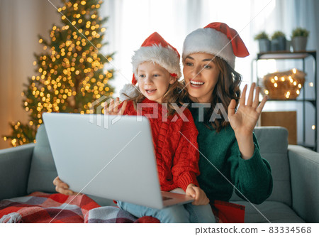 family celebrating Christmas 83334568