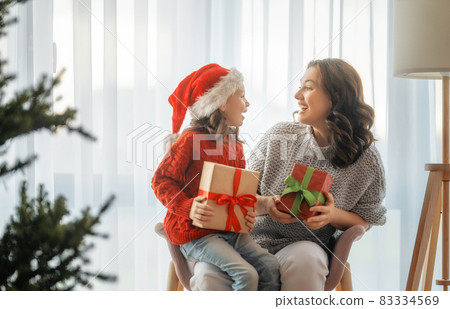 family celebrating Christmas family celebrating Christmas 83334569