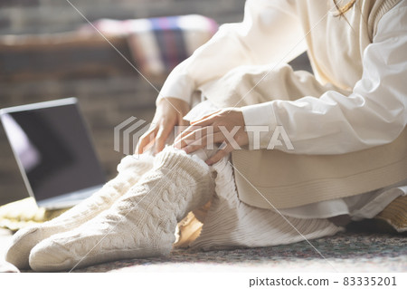 A woman wearing socks 83335201