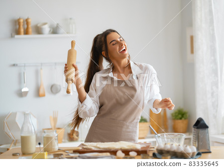woman is preparing bakery. 83335645