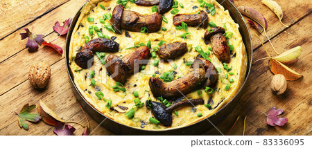 Homemade pie or quiche with mushrooms 83336095