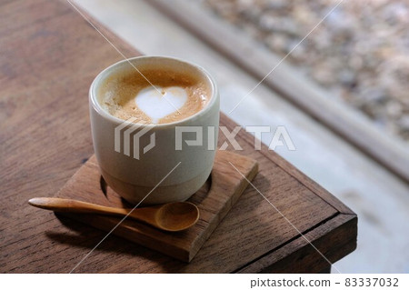 Cup of coffee latte Cup of coffee latte 83337032