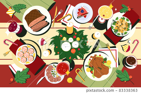 Christmas table top view with dishes and decorated cutlery 83338363