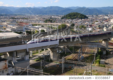Shinkansen running in Fukushima City (Fukushima City, Fukushima Prefecture) 83338667