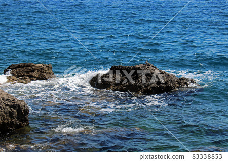 View from Ika's seaside promenade, rocks of the beach, Adriatic coast, Kvarner bay, city details, Croatia View from Ika's seaside promenade, rocks of the beach, Adriatic coast, Kvarner bay, city details, Croatia 83338853