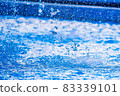Water droplets and splashes falling on the surface of the water 83339101