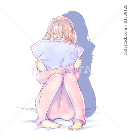 A woman holding a cushion with an uneasy atmosphere A woman holding a cushion with an uneasy atmosphere 83339126