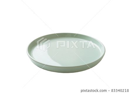Blue ceramic round plate isolated over white background. perspective view Blue ceramic round plate isolated over white background. perspective view 83340218