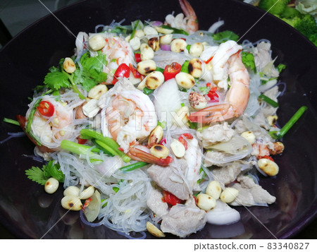 Thai spicy glass noodle salad with a shrimp and pork on the plate 83340827