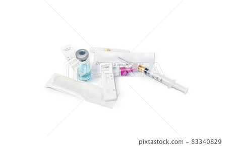 Medical infectious waste on white background, drug vial,needle syringe,tape result of rapid test 83340829
