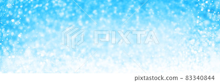 Christmas blue snow Background. Holiday Abstract Glitter Defocused Background With Blinking Stars.Holiday glowing backdrop.Banner 83340844