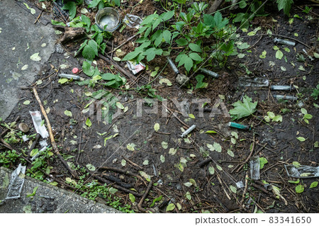 bunch of used dirty syringe leaved after drug injection lying on ground outdoor bunch of used dirty syringe leaved after drug injection lying on ground outdoor 83341650