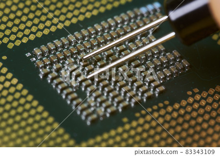Macro-shot of computer microchip processor. Global chip and semiconductor shortage. Symbol of ongoing crisis in car industry. Concept of high demand for integrated circuits Macro-shot of computer microchip processor. Global chip and semiconductor shortage. Symbol of ongoing crisis in car industry. Concept of high demand for integrated circuits 83343109