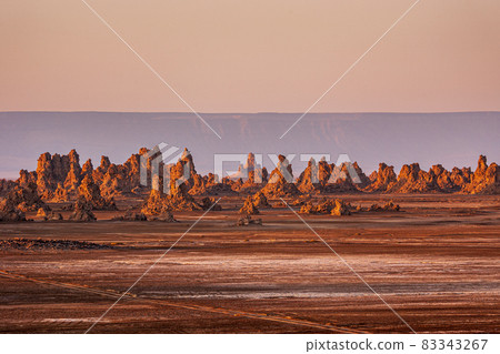 Sizzling limestone chimneys at Lake Abhe in Djibouti 83343267