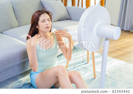 woman suffering from summer heat woman suffering from summer heat 83343442