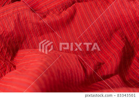 Red striped cloth. Angled view from above Red striped cloth. Angled view from above 83343501
