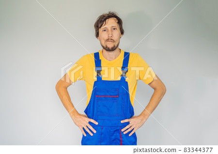 Builder thinking. Man in builder uniform pondered. Portrait of builder thinking about something. Architect Engineer on white background. Construction company worker 83344377