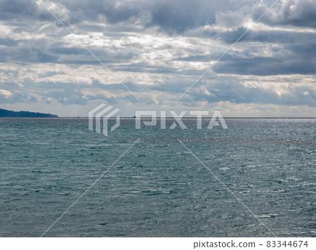 cloudy sky with gray clouds on the horizon 83344674